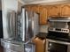 Stainless steel appliances and wood cabinets at 916 Kentucky St, Haines City, FL 33844