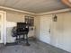 Covered patio with brick siding and a grill at 916 Kentucky St, Haines City, FL 33844