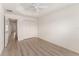Bedroom with tray ceiling, ceiling fan, and closet for comfortable living at 9181 Se 166Th Sprung Ln, The Villages, FL 32162