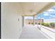 Relax on this lanai with a ceiling fan and peaceful views at 9181 Se 166Th Sprung Ln, The Villages, FL 32162