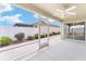The screened lanai provides a relaxing space with views of the backyard at 9181 Se 166Th Sprung Ln, The Villages, FL 32162