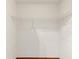 Walk-in closet with wire rack storage on the upper shelf at 9236 County Road 48, Yalaha, FL 34797