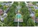 Aerial view of a complex with a clubhouse, pool and surrounding condos at 1021 Siena Park Blvd # 204, Kissimmee, FL 34747