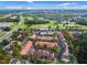 Aerial view of the community, golf course, and surrounding landscape at 1021 Siena Park Blvd # 204, Kissimmee, FL 34747