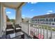 This balcony features outdoor seating and a view of the neighborhood at 1021 Siena Park Blvd # 204, Kissimmee, FL 34747