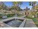 An attractive community clubhouse featuring a fountain and manicured landscaping, offering a great first impression at 1021 Siena Park Blvd # 204, Kissimmee, FL 34747