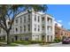 Exterior view of a multi-story condo building featuring classic architectural details and landscaped grounds at 1021 Siena Park Blvd # 204, Kissimmee, FL 34747