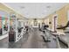 Community gym featuring strength and cardio equipment with ample natural light at 1021 Siena Park Blvd # 204, Kissimmee, FL 34747