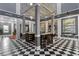 Upscale lobby with classic decor, including tiled floors and bar seating for a refined touch at 1021 Siena Park Blvd # 204, Kissimmee, FL 34747