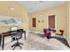 Community lobby featuring computer workstation, gathering table, and informational map at 1021 Siena Park Blvd # 204, Kissimmee, FL 34747