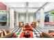 This community lobby is styled with checkered floors and holiday decor at 1021 Siena Park Blvd # 204, Kissimmee, FL 34747