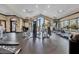 Well-equipped gym features an array of weight machines, treadmills, and fitness equipment for residents at 1027 Timbervale Trl, Clermont, FL 34715