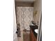 Cozy bathroom featuring tile flooring and a shower/tub combination at 1033 N Jacks Lake Rd, Clermont, FL 34711