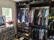 Closet with custom shelving and clothing racks maximizing storage at 1033 N Jacks Lake Rd, Clermont, FL 34711