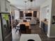 Open-concept living and dining area seamlessly flowing from the kitchen, great for entertaining at 1033 N Jacks Lake Rd, Clermont, FL 34711