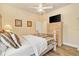 Bedroom features neutral walls, a closet, and wood floors at 10465 Se 41St Ter, Belleview, FL 34420