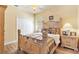 Comfortable bedroom featuring a closet and natural light at 10465 Se 41St Ter, Belleview, FL 34420