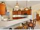 Well-appointed kitchen with marble countertops, stainless appliances, and bar seating at 10465 Se 41St Ter, Belleview, FL 34420