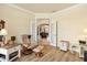 Home office with neutral tones, a comfortable chair and natural light at 10465 Se 41St Ter, Belleview, FL 34420