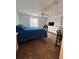 Comfortable bedroom featuring a queen-sized bed, ceiling fan and furniture at 1060 Davenport Dr, The Villages, FL 32162