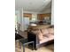 A stylish living room and kitchen area at 1060 Davenport Dr, The Villages, FL 32162