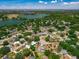 Aerial view of the community surrounding the home near a lake at 111 Ridgeview Cir, Eustis, FL 32726