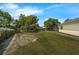 Expansive backyard featuring mature trees and ample green space, perfect for outdoor activities at 111 Ridgeview Cir, Eustis, FL 32726
