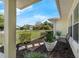Charming front porch with a bench, plants, and walkway leading to the yard at 111 Ridgeview Cir, Eustis, FL 32726