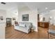 Inviting living room featuring wood floors, neutral tones, and comfortable seating, creating a cozy and welcoming atmosphere at 111 Ridgeview Cir, Eustis, FL 32726