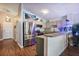 Modern kitchen featuring stainless steel appliances, sleek countertops, and a unique nautical theme at 12430 Ne 52Nd Loop, Oxford, FL 34484