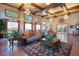 Resident lounge with comfortable seating, hardwood floors, and elegant finishes at 12430 Ne 52Nd Loop, Oxford, FL 34484