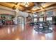 Spacious resident lounge with a full bar, comfortable seating, and elegant decor at 12430 Ne 52Nd Loop, Oxford, FL 34484