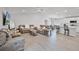 Bright open concept living room, dining and kitchen area with lots of room to entertain at 1247 Mezzavalle Way, Auburndale, FL 33823