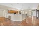 Open kitchen with terracotta tile and countertops, seamlessly blending functionality and style for cooking and gathering at 12512 Lake Ridge Cir, Clermont, FL 34711