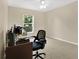 Office space with carpet and a window for plenty of natural light at 12512 Lake Ridge Cir, Clermont, FL 34711