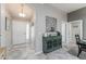 Inviting foyer showcasing tile floors and elegant decor at 1309 Piney Woods Path, The Villages, FL 32163