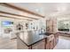 Modern kitchen with an expansive island, updated appliances, and open access to the living area at 13332 Via Roma Cir, Clermont, FL 34711