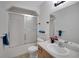 Clean bathroom with a shower-tub combo, vanity, and fresh decor at 14490 Se 96Th Ter, Summerfield, FL 34491