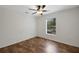 Bright, empty bedroom with window and ceiling fan; clean and ready for personalization at 14490 Se 96Th Ter, Summerfield, FL 34491