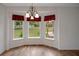 Bright dining area with a bay window that offers lots of natural light at 14490 Se 96Th Ter, Summerfield, FL 34491