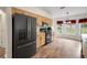 A bright eat-in kitchen boasting modern appliances and ample counter space, perfect for casual dining at 14490 Se 96Th Ter, Summerfield, FL 34491