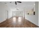 Bright living room featuring vaulted ceilings, ceiling fans, and hardwood floors for a modern, open feel at 14490 Se 96Th Ter, Summerfield, FL 34491