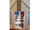Quirky dog room with checkered floors and a cute sign above the entry at 14832 Royal Poinciana Dr, Orlando, FL 32828