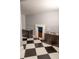 Spacious dog room with built-in feeding stations and black and white checkered flooring at 14832 Royal Poinciana Dr, Orlando, FL 32828
