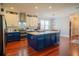 Spacious kitchen featuring an island, modern appliances, and ample cabinetry at 14832 Royal Poinciana Dr, Orlando, FL 32828