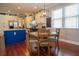 Bright and airy kitchen featuring a central island, breakfast nook, and stainless appliances at 14832 Royal Poinciana Dr, Orlando, FL 32828