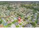 A peaceful residential area shows the home's desirable location with tree-lined streets, convenient access, and community charm at 17916 Se 87Th Melrose Ct, The Villages, FL 32162