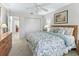 Bedroom featuring neutral walls, carpet floors, and a ceiling fan at 17916 Se 87Th Melrose Ct, The Villages, FL 32162