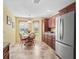 Bright dining area with natural light and cozy seating at 17916 Se 87Th Melrose Ct, The Villages, FL 32162