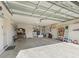 Spacious garage with ample storage and utility features at 17916 Se 87Th Melrose Ct, The Villages, FL 32162